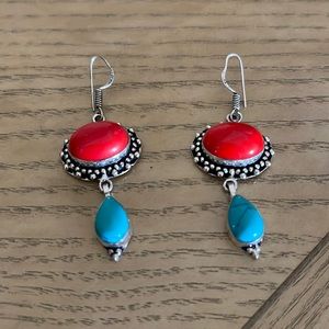 Coral and turquoise earrings set in sterling silver. Appropriately 2 inches